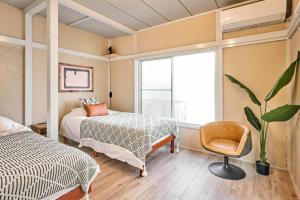 Ένα ή περισσότερα κρεβάτια σε δωμάτιο στο 和氣会々野方 Wakiaiai Nogata