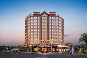 a rendering of a hotel with a building at Intercity Jinghong Xishuangbanna in Jinghong