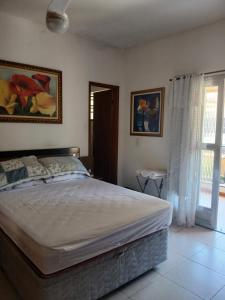 Postel nebo postele na pokoji v ubytování Recanto do Pozzato