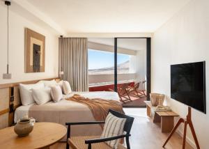 Televízia a/alebo spoločenská miestnosť v ubytovaní Paradisus by Meliá Fuerteventura - All Inclusive