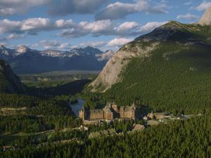 a town in the middle of a valley with a mountain at Fairmont Banff Springs in Banff