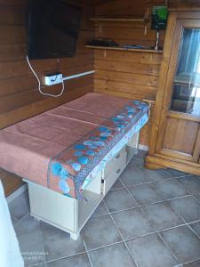a bench in a room next to a door at Chalet at Villa Don Quijote Nice in Nice +28 photos