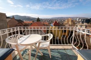 A balcony or terrace at Hotel Kristal Gellért Hill