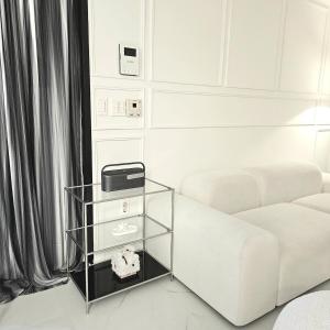 Ένα ή περισσότερα κρεβάτια σε δωμάτιο στο Domostay