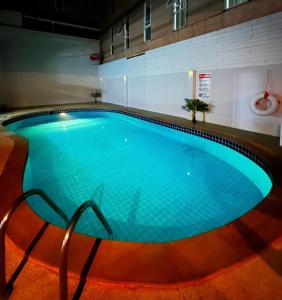 Bazén v ubytování Lime Hotel nebo v jeho okolí