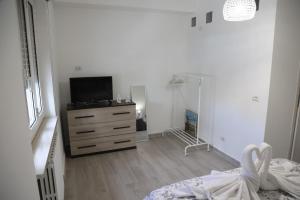 TV a/nebo společenská místnost v ubytování Sognare in Puglia