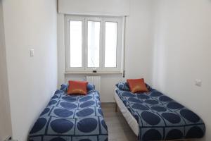 Postel nebo postele na pokoji v ubytování Sognare in Puglia