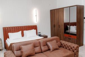 Postel nebo postele na pokoji v ubytování INFINITY PLAZA BLOCK 1