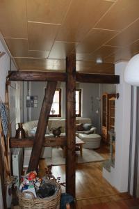 a living room with a bed and a toilet at Ferienwohnung Sabine in Zella-Mehlis