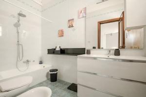 Koupelna v ubytování KuMmìe - Casa Vacanze + 2 fotografie