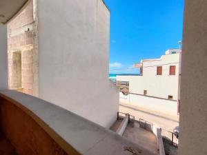 Balkón nebo terasa v ubytování Quadrilocale Dafne 2 in centro vista mare Salento Ugento