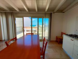 Fotografie z fotogalerie ubytování Quadrilocale Dafne 2 in centro vista mare Salento Ugento v destinaci Torre San Giovanni Ugento + 23 fotografií