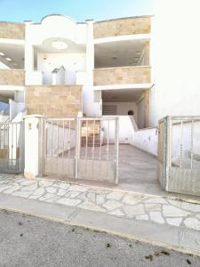 Balkón nebo terasa v ubytování Quadrilocale Dafne 2 in centro vista mare Salento Ugento