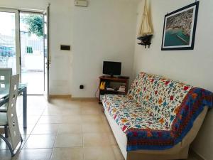 TV a/nebo společenská místnost v ubytování Casa Iris in Otranto