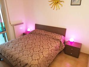 Postel nebo postele na pokoji v ubytování Casa Iris in Otranto