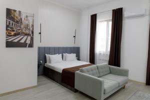 Postel nebo postele na pokoji v ubytování INFINITY PLAZA BLOCK 1