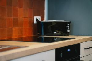 Kuchyň nebo kuchyňský kout v ubytování Capstay - Charleroi