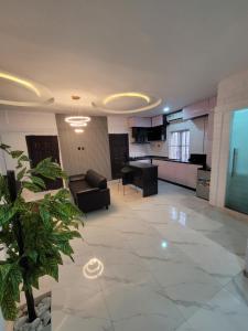 Kuchyň nebo kuchyňský kout v ubytování Conrad Cottage Apartments + 36 fotografií