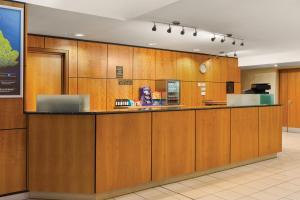a lobby with a counter in a restaurant at Days Inn Stevenage North in Baldock