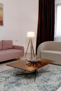 Posezení v ubytování INFINITY PLAZA BLOCK 1