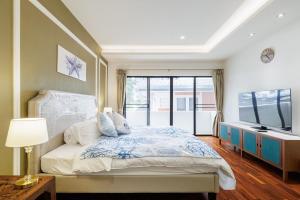 Postel nebo postele na pokoji v ubytování Luxurious 6BR Villa with Pool & Games at Sukhumvit + 78 fotografií