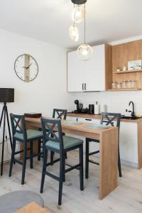 Dapur atau dapur kecil di Apartman Grozd