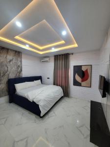 TV a/nebo společenská místnost v ubytování Conrad Cottage Apartments