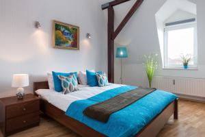 Posteľ alebo postele v izbe v ubytovaní Neo Apartments