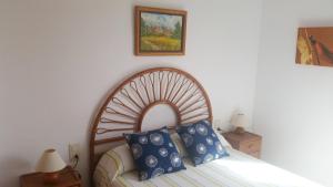 Postel nebo postele na pokoji v ubytování Casa a 85 metros playa 158 m dorm WIFI AA