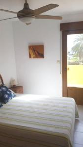 Postel nebo postele na pokoji v ubytování Casa a 85 metros playa 158 m dorm WIFI AA