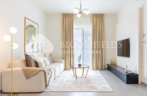 Μια τηλεόραση ή/και κέντρο ψυχαγωγίας στο Bloomfields Stylish 2Br Maid Noya Viva