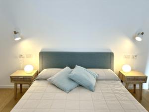 Ένα ή περισσότερα κρεβάτια σε δωμάτιο στο Casa Le Vittorie