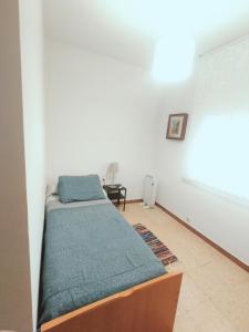 Posteľ alebo postele v izbe v ubytovaní Apartamento duplex vacacional