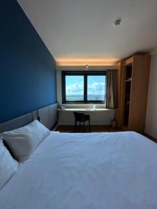 Postel nebo postele na pokoji v ubytování Ibis Roma Fiera
