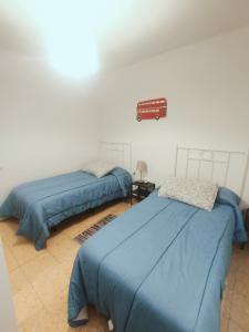 Posteľ alebo postele v izbe v ubytovaní Apartamento duplex vacacional