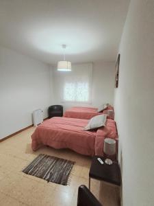 Posteľ alebo postele v izbe v ubytovaní Apartamento duplex vacacional