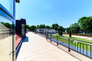 a walkway on the roof of a building at Aleksandra Resort in Tuchom