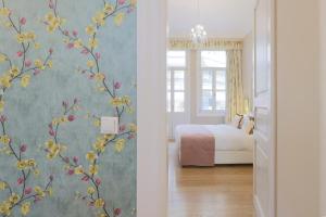 Postel nebo postele na pokoji v ubytování Gatto Perso Luxury Studio Apartments