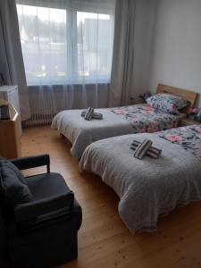 Postel nebo postele na pokoji v ubytování Zimmervermietung Pargen + 6 fotografií