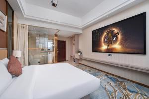 Penguin international hotel Baiyun Airport & C-harge shuttle bus for the Canton fair from April 15-May 5客房内的一张或多张床位