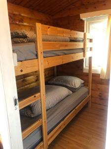 Palanda nebo palandy na pokoji v ubytování Misty Mountain Log Cabin - Trawsfynydd