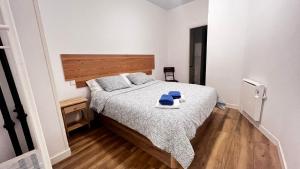 Postel nebo postele na pokoji v ubytování Apartamentos corazón de Chamberí
