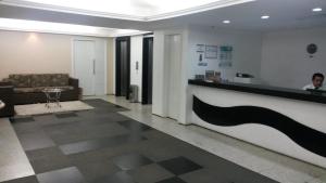 a lobby of a hotel with a reception desk at Villa Costeira Beira Mar in Fortaleza +18 photos