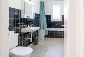 Baðherbergi á Gemütliche Wohnung Nähe Uni