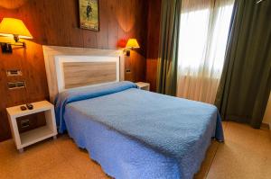 Katil atau katil-katil dalam bilik di Hotel Venta La Pintada