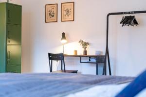 Rúm í herbergi á Gemütliche Wohnung Nähe Uni