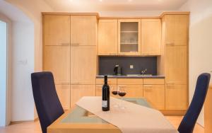 Kuchyň nebo kuchyňský kout v ubytování Studio apartman La Vitta