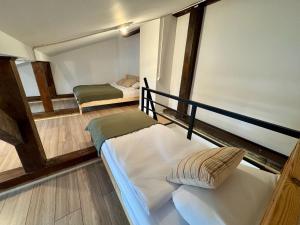 Ένα ή περισσότερα κρεβάτια σε δωμάτιο στο Cozy Cottage