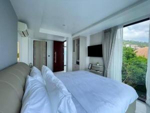 Кровать или кровати в номере The Blue Lion Villa Samui +31 фотография