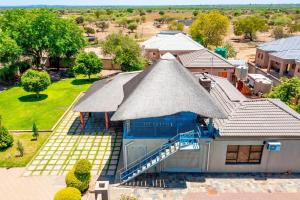 an overhead view of a house with a roof at Laicah House in Tlokweng